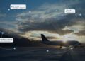 Aircraft on a runway at sunset with live tracking routes, a temperature reading and a geofence alert overlaid