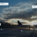 Aircraft on a runway at sunset with live tracking routes, a temperature reading and a geofence alert overlaid